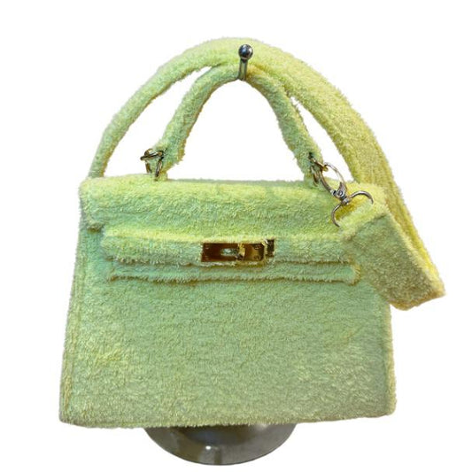 Terry Bag 25, crossbody botergeel met gouden hardware